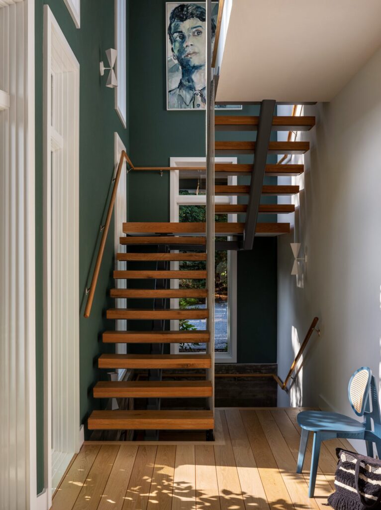 Stairwell interior design with architectural lines and modern detailing by Andrew Suvalsky Designs in East Hampton New York.